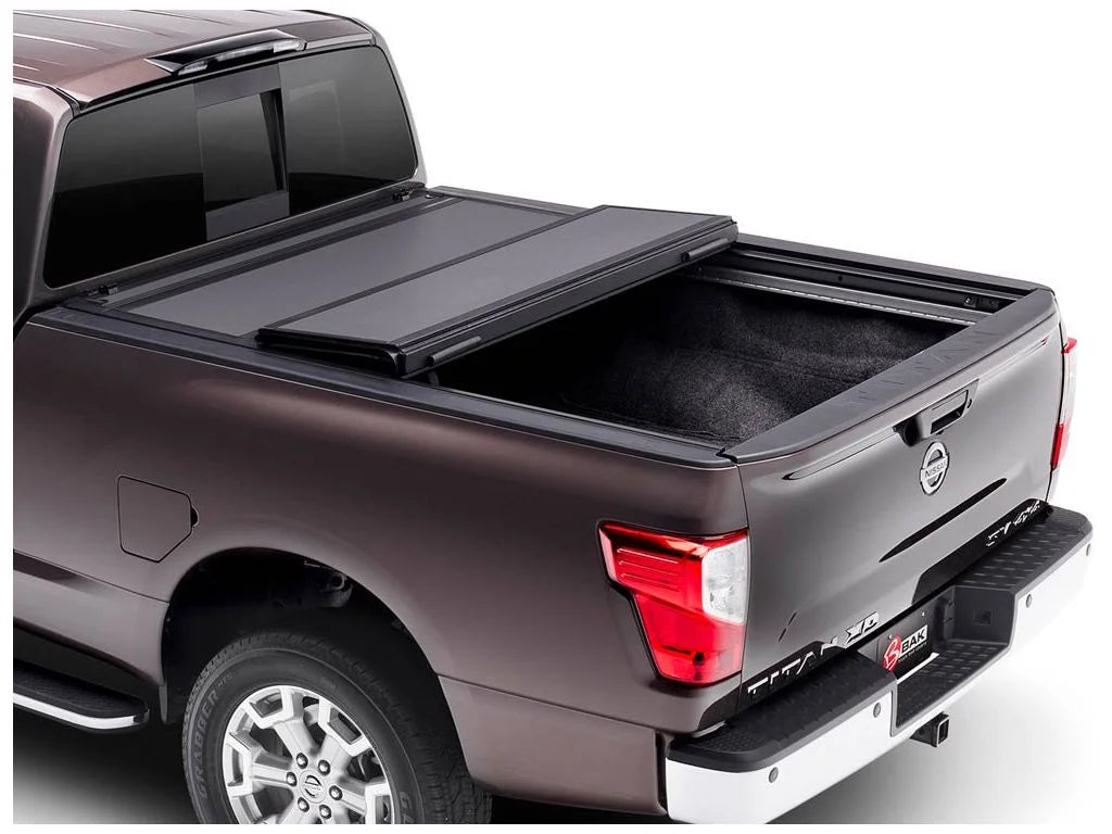 BAK by RealTruck BAKFlip MX4 Hard Folding Truck Bed Tonneau shield | 448525 | matching with 2017 - 2023 Nissan Titan 5' 7" Bed (67")