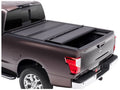 BAK by RealTruck BAKFlip MX4 Hard Folding Truck Bed Tonneau shield | 448525 | matching with 2017 - 2023 Nissan Titan 5' 7" Bed (67")