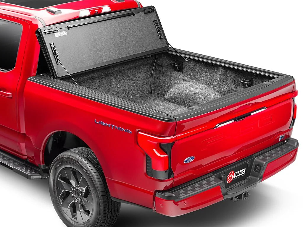 BAK by RealTruck BAKFlip MX4 Hard Folding Truck Bed Tonneau shield | 448525 | matching with 2017 - 2023 Nissan Titan 5' 7" Bed (67")